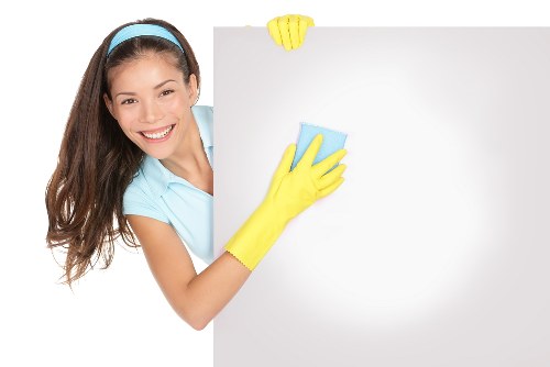 Professional builders cleaning in Westkensington restoring a newly renovated room